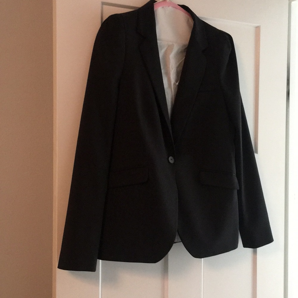 Worn once. Black jacket. Single button